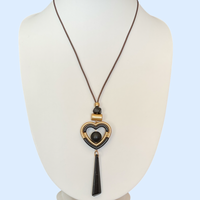 Bijoux | Collier avec pendentif en cœur noir et doré