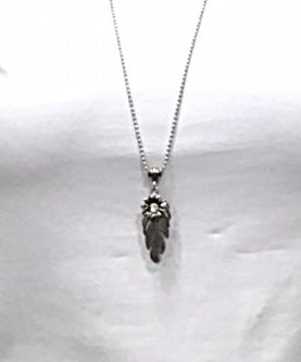 Bijoux | Collier avec une chaîne argent et pendentif de plume