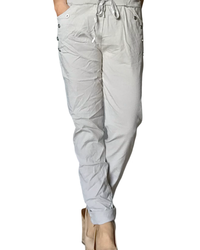 Pantalon beige à taille élastique avec cordon et boutons décoratifs