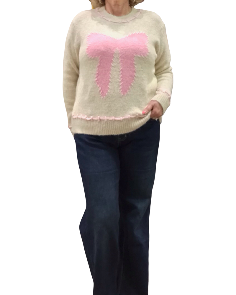 Chandail col rond beige en tricot avec une boucle devant